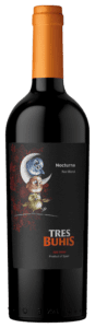 Red wine bottle with owl label
